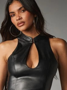 1. Close-up of a black faux leather keyhole halter top showing the short stand collar, small front fastening and smooth shaped bust panels.