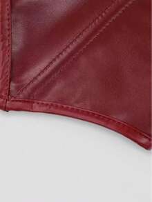 Close-up of a dark red leather or faux-leather material corner with visible stitching and a curved edge, set against a light gray background.