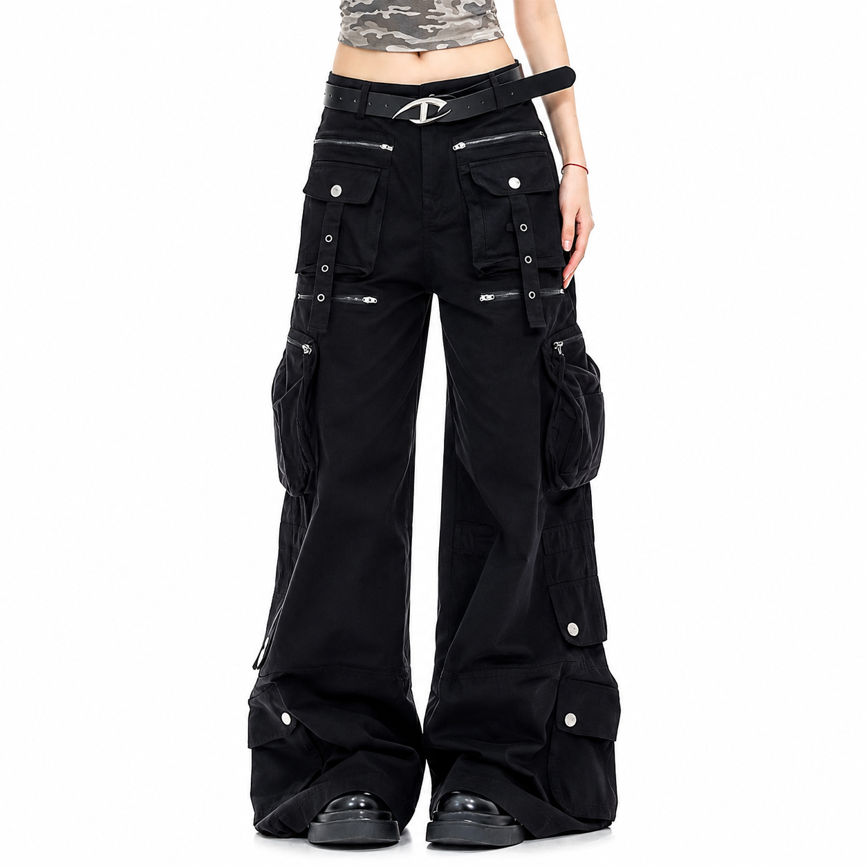 Black wide-leg cargo pants with multiple utility pockets, silver-tone hardware, and a matching black belt, shown on a model against a white background.