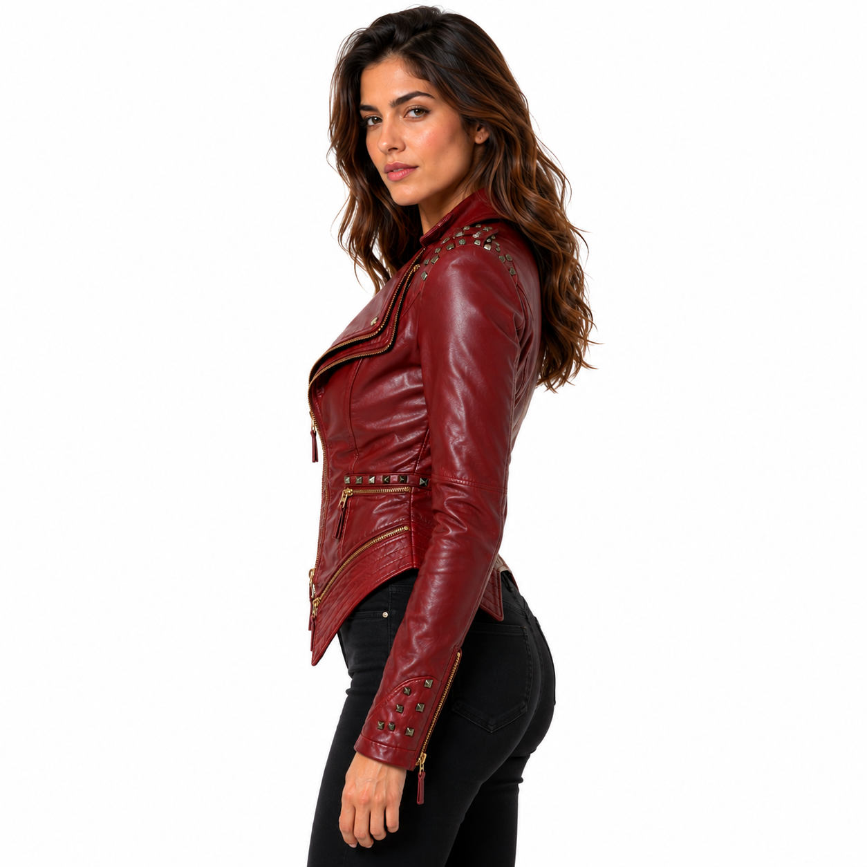 A woman wearing a dark red leather moto jacket with silver studs and zippers, paired with black pants, shown in profile against a solid white background.