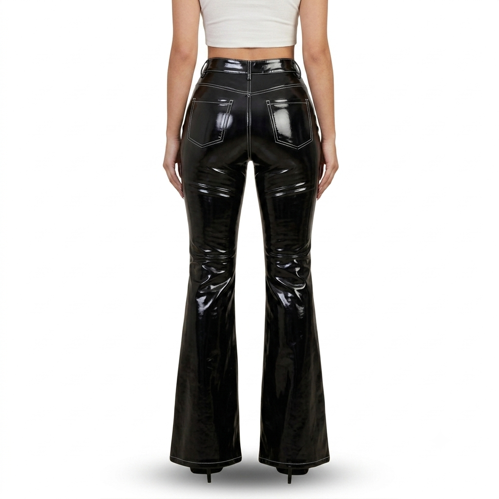 A model shown from the back wearing high-waisted, glossy black patent leather flare pants, paired with a white crop top, against a plain white background.